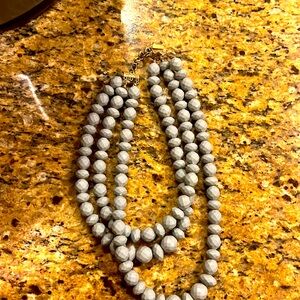 Necklace with grey beads